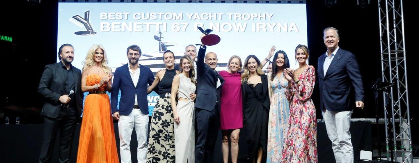 The Benetti team celebrates winning Best Custom Yacht at the World Yachts Trophies 2024 ceremony