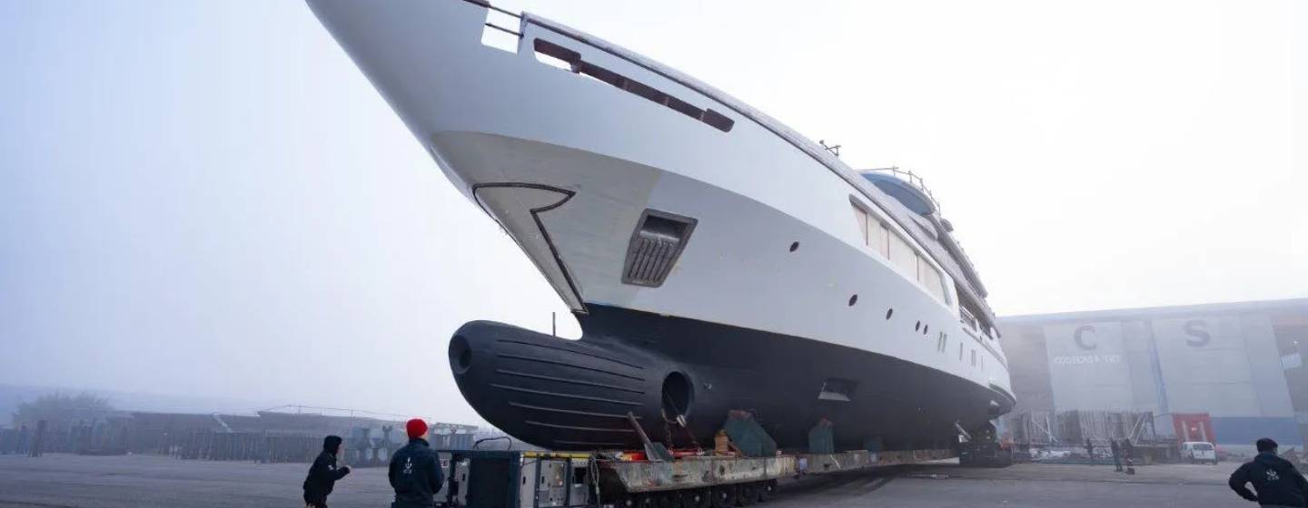 Hull F81 by Codecasa being moved for outfitting