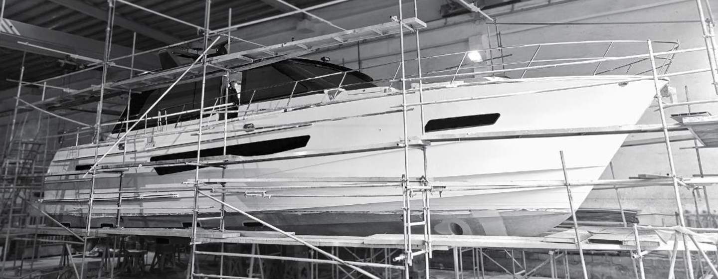 CL Yachts CLB65 SUV motor yacht under construction in black and white