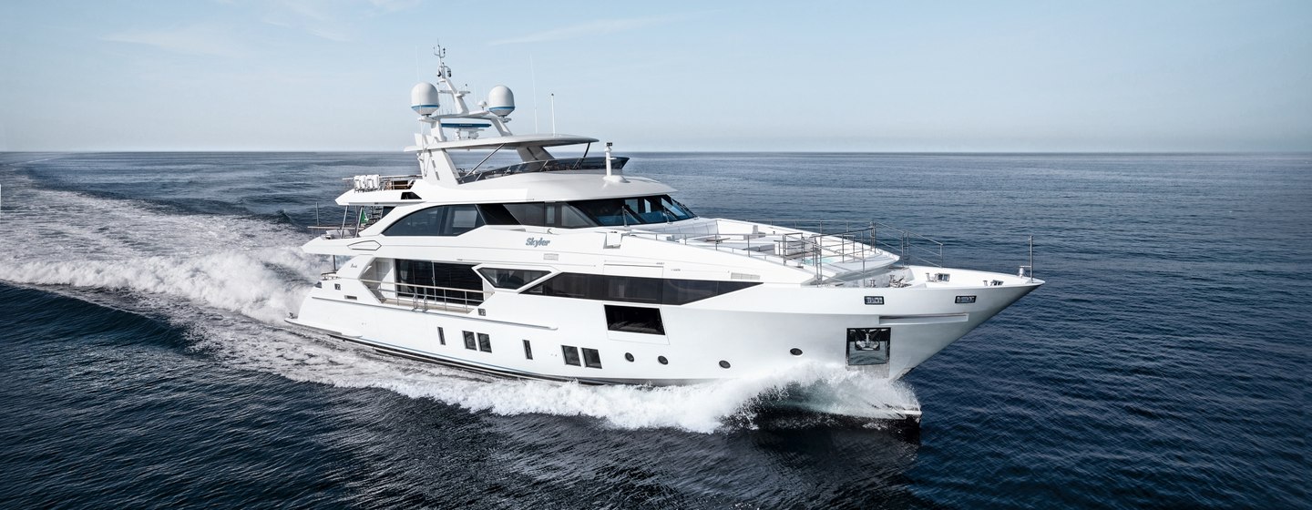 Motor yacht SKYLER underway, surrounded by sea