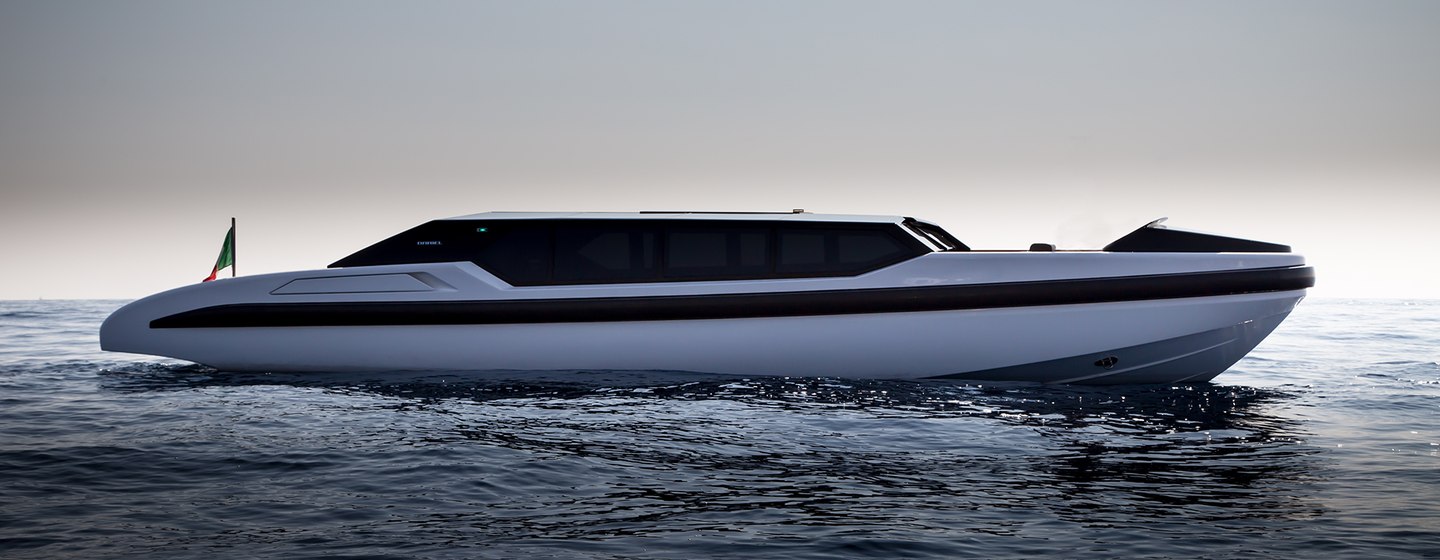 Limo tender on sea, with dark sky in background