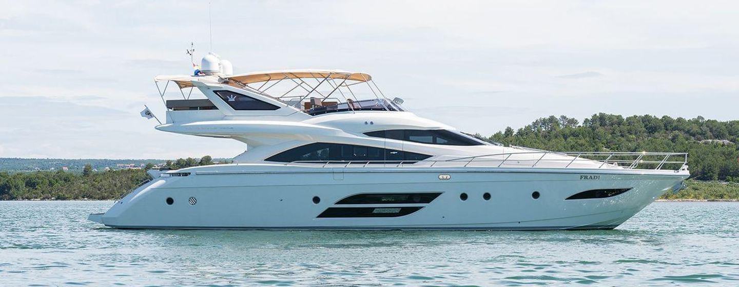 Dominator yacht Fradi at anchor side view 