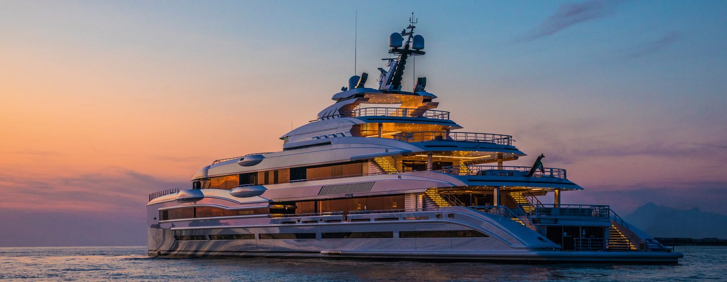 LANA superyacht by Benetti on calm sea at twilight