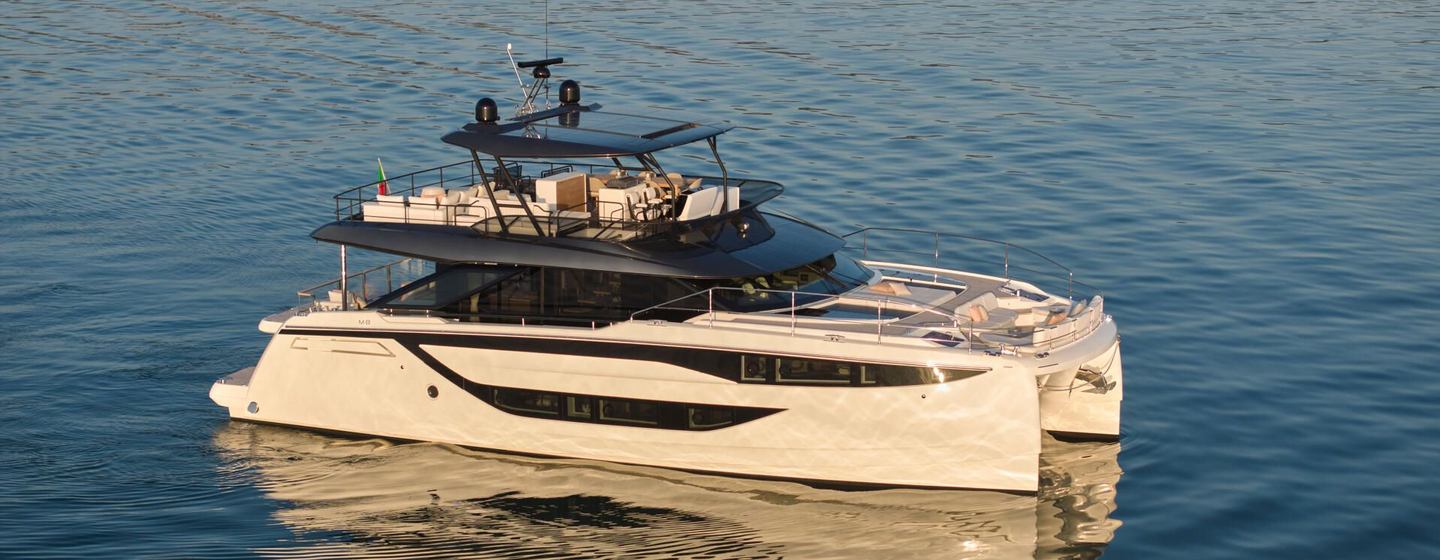Prestige M8 Evo catamaran at anchor side view 