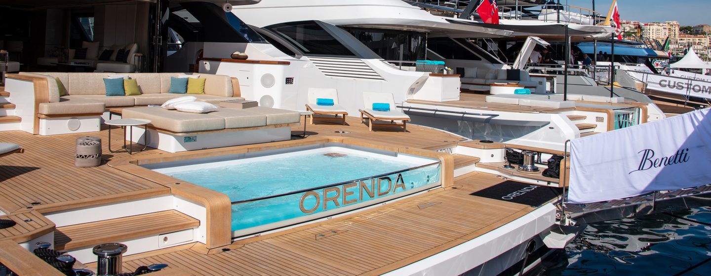 Benetti Oasis 40M yacht ORENDA pictured in Cannes at the boat show, shot across aft deck featuring the pool, taken from dock over port side