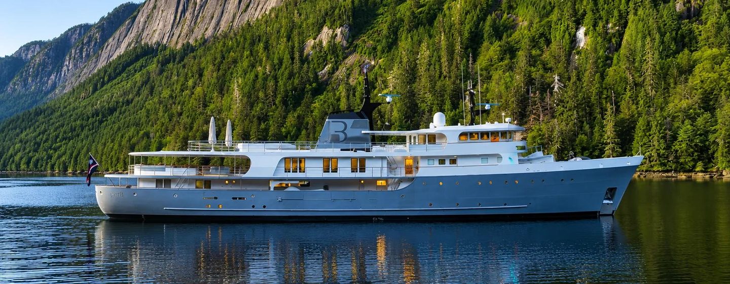 Amels expedition yacht Just B at anchor side view 