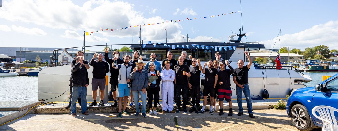 Team and owners in front of second Archipelago 47 Explorer Catamaran