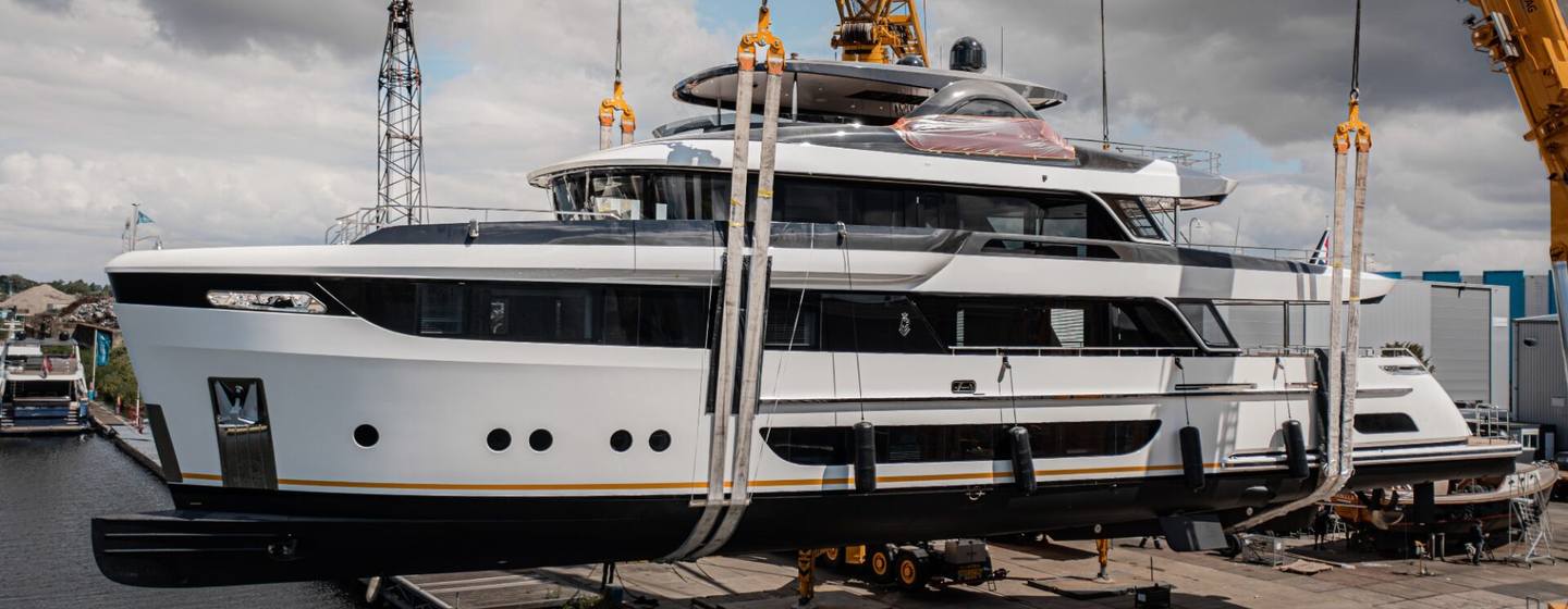 Superyacht Lalabe being lowered into the water at launch