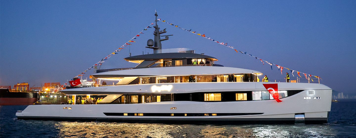 Mengi Yay Vitrus XP Explorer Yacht Gray Wolf at launch with bunting 