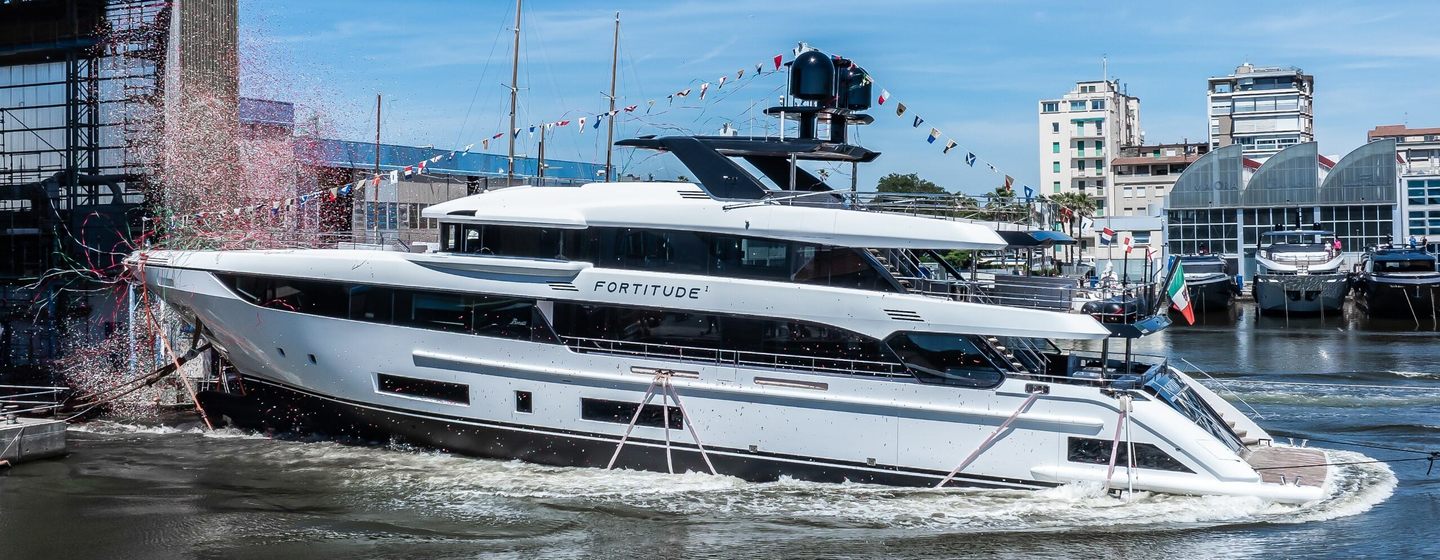 Motor yacht Fortitude 1 sliding down into water at launch
