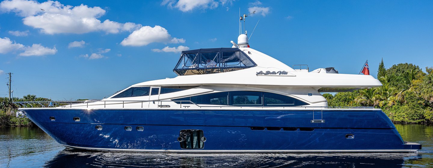 Ferretti motor yacht La Bella Vita at anchor side view 