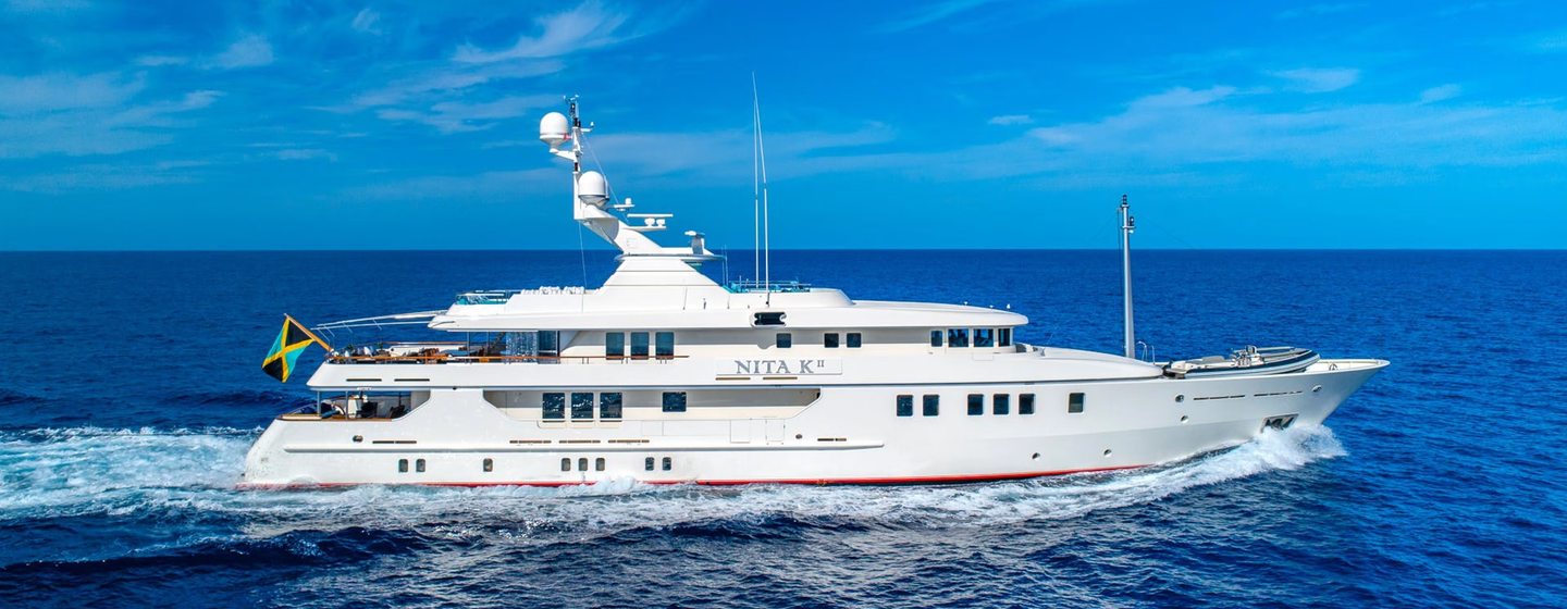 Motor yacht Nita K II underway on a sunny day