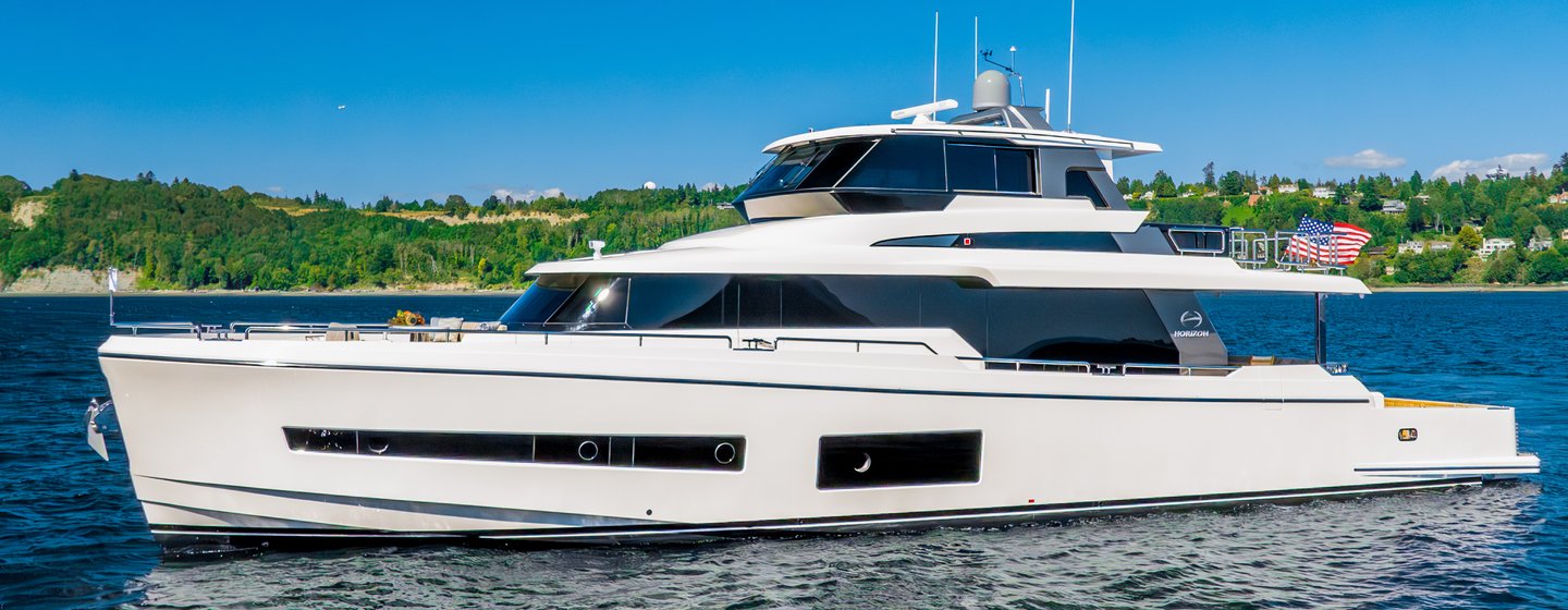 Horizon V77s hull 13 motor yacht at anchor 