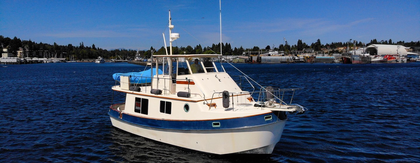 Kadey-Krogen motor yacht Amazing Grace at anchor side view 
