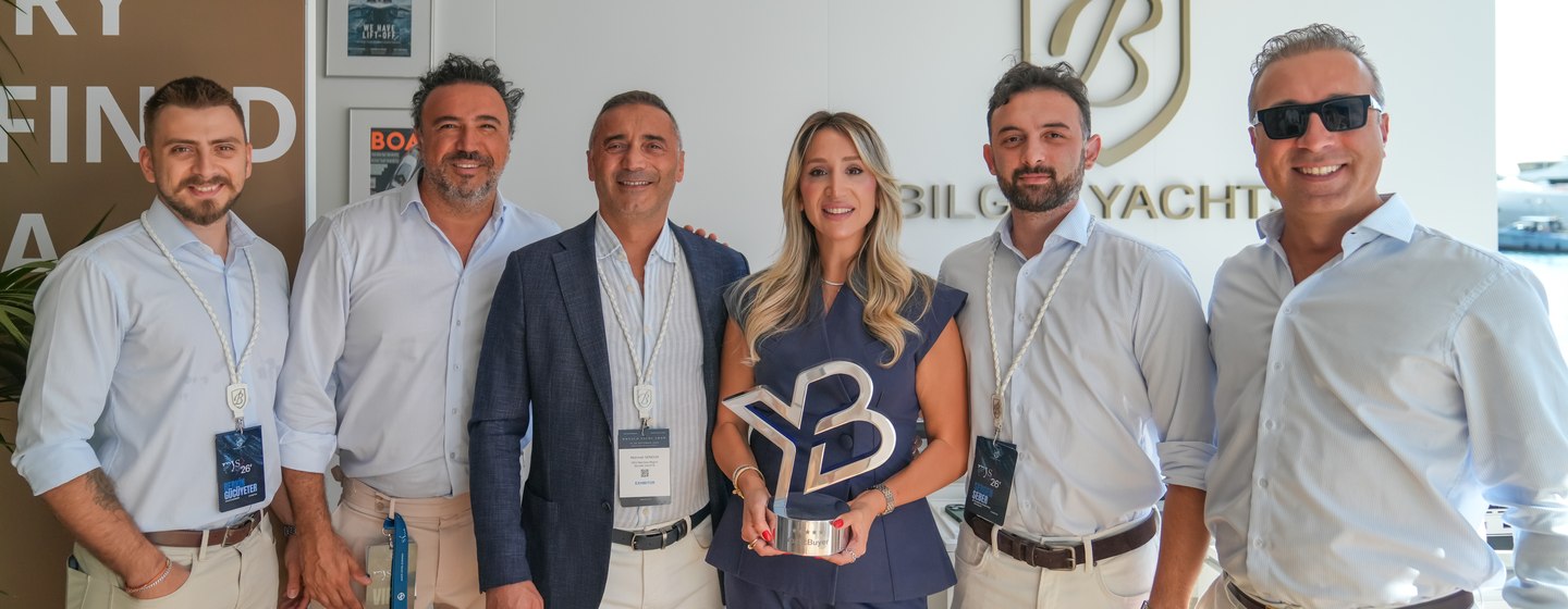 The Bilgin Team with the YachtBuyer Hall of Fame trophy at the Monaco Yacht Show 