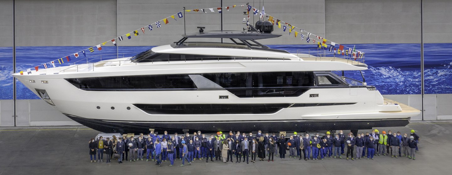 Ferretti Group workers stood in front of Ferretti Yachts 1000