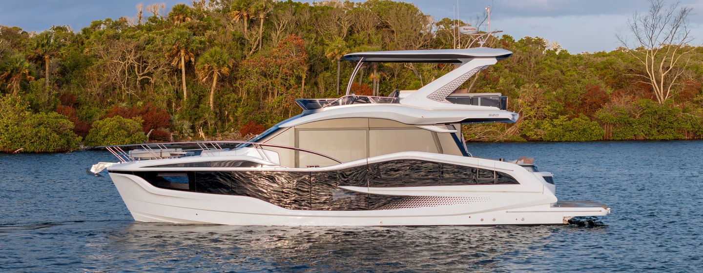 Galeon 520 Fly yacht at anchor side view 