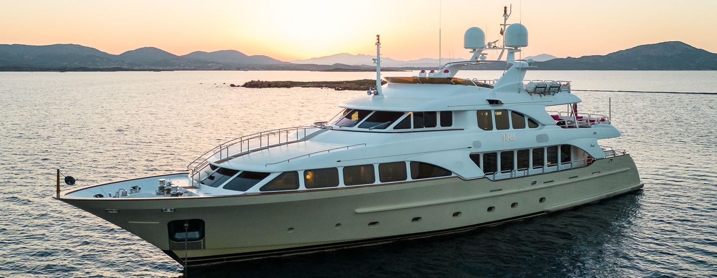Benetti motor yacht Virtue at anchor side view 