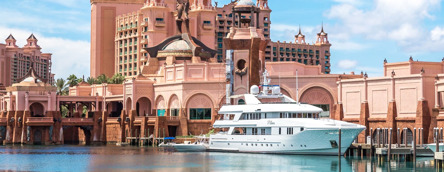 Overview of Atlantis Resort Nassau, Bahamas. With superyacht docked out front. 