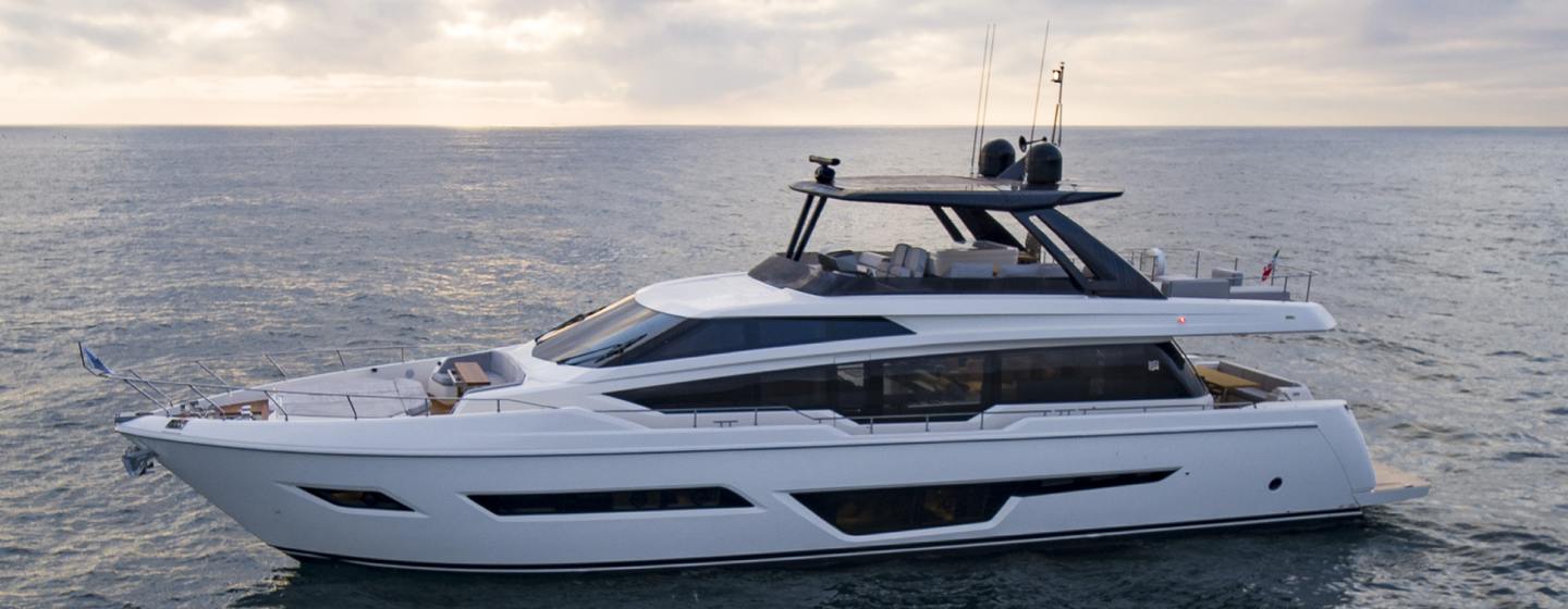Ferretti motor yacht Alveare at anchor side view 