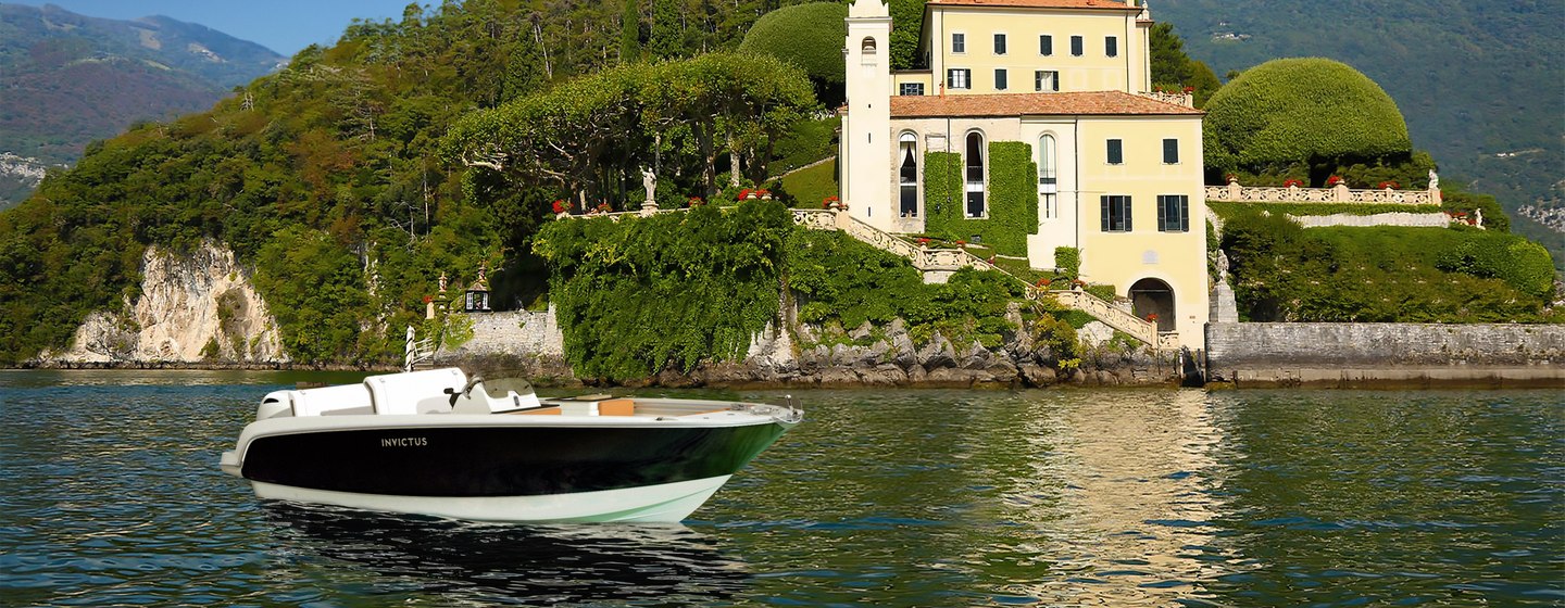 Invictus Yachts SX200 in front of scenic backdrop