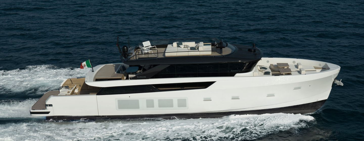 Bluegame BGX83 motor yacht underway side view 
