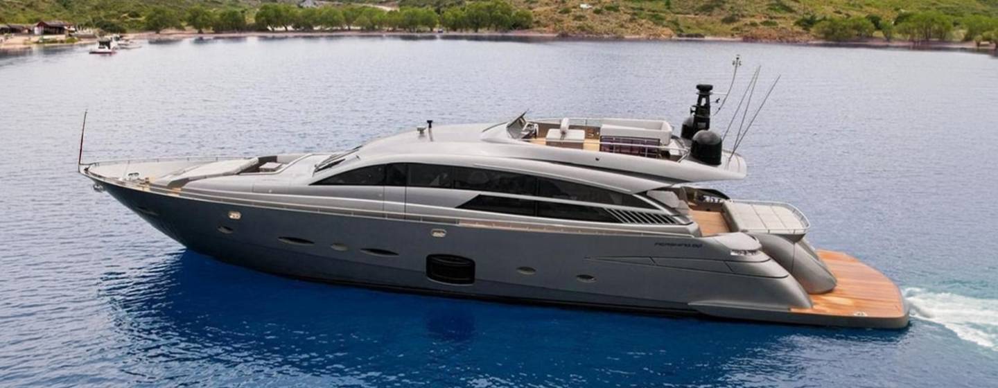 Pershing motor yacht Honey Badger at anchor side view