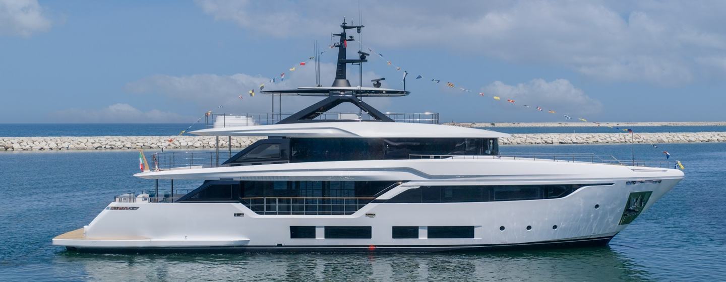 Custom Line Navetta 35 motor yacht at anchor side view 