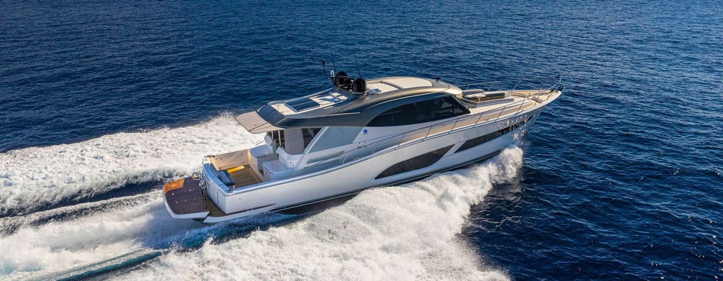 Riviera 645 SUV Series II motor yacht underway side view 