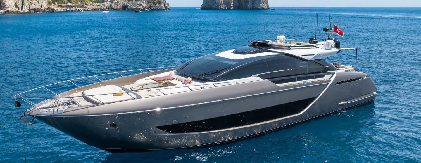 Riva motor yacht Kar at anchor side view 