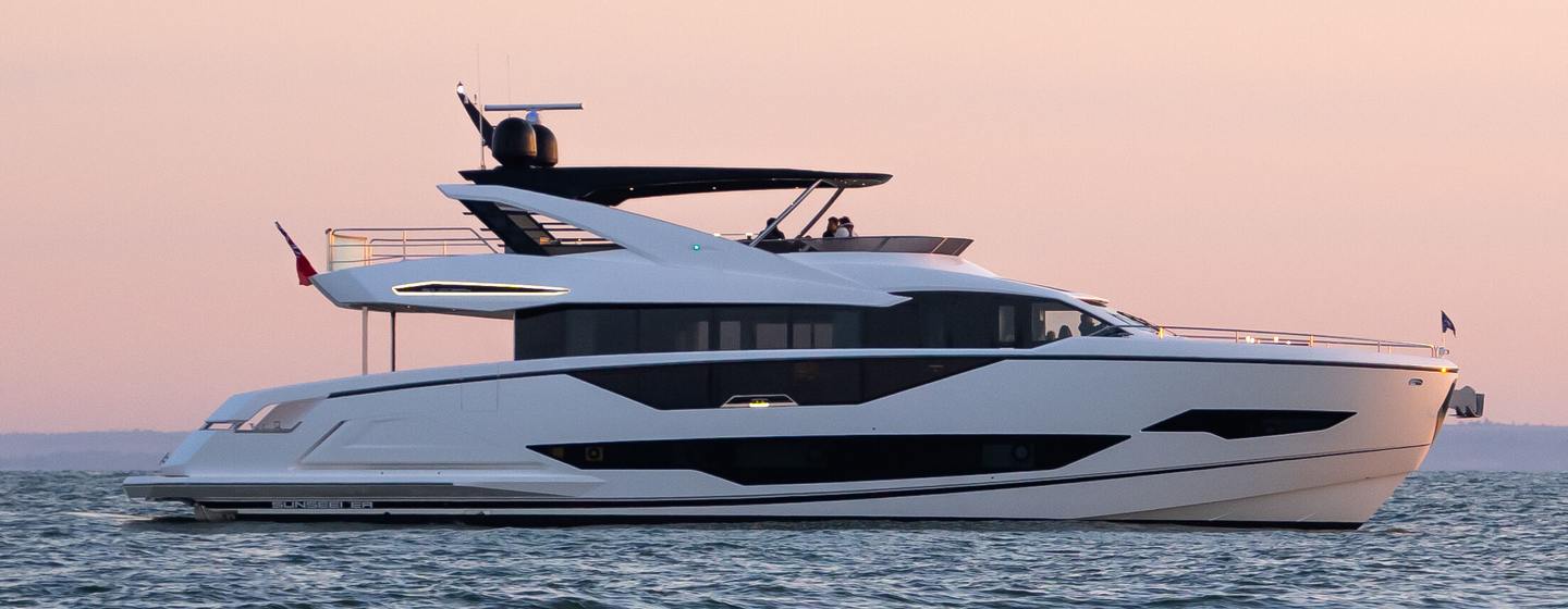 Sunseeker motor yacht Triple Eight at anchor side view 