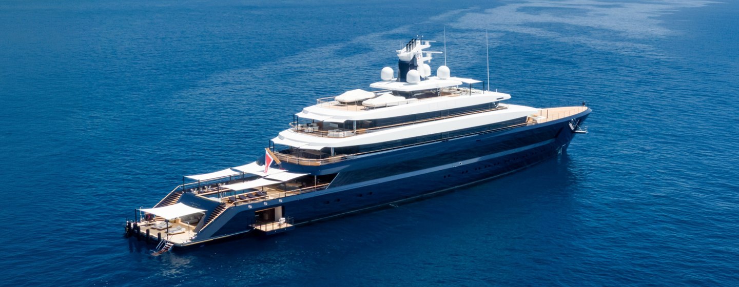 Feadship superyacht Drizzle at anchor stern view 