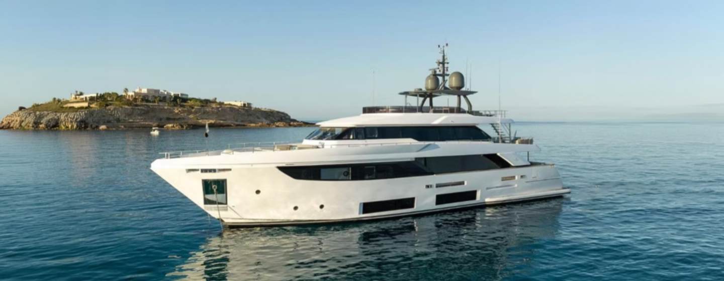 Custom Line motor yacht On at anchor side view 