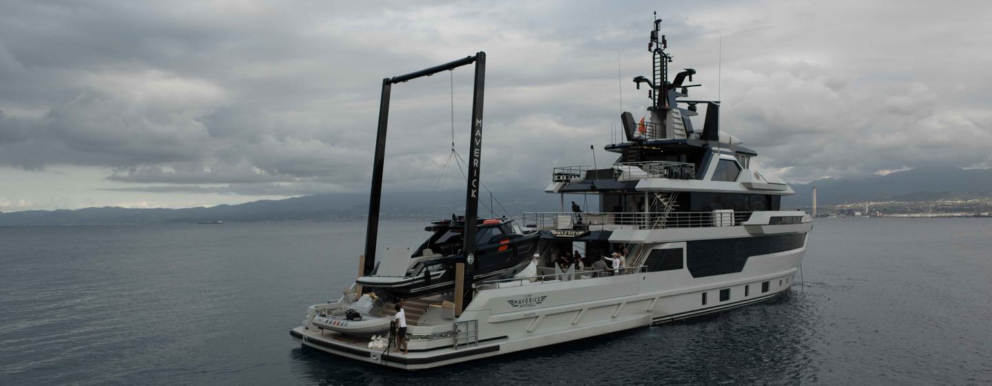 Cantiere delle Marche superyacht Maverick at anchor with crane 