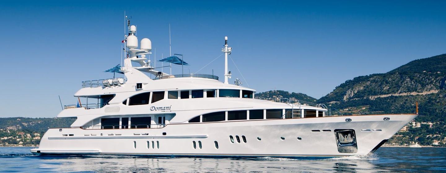 Benetti motor yacht Domani at anchor side view 