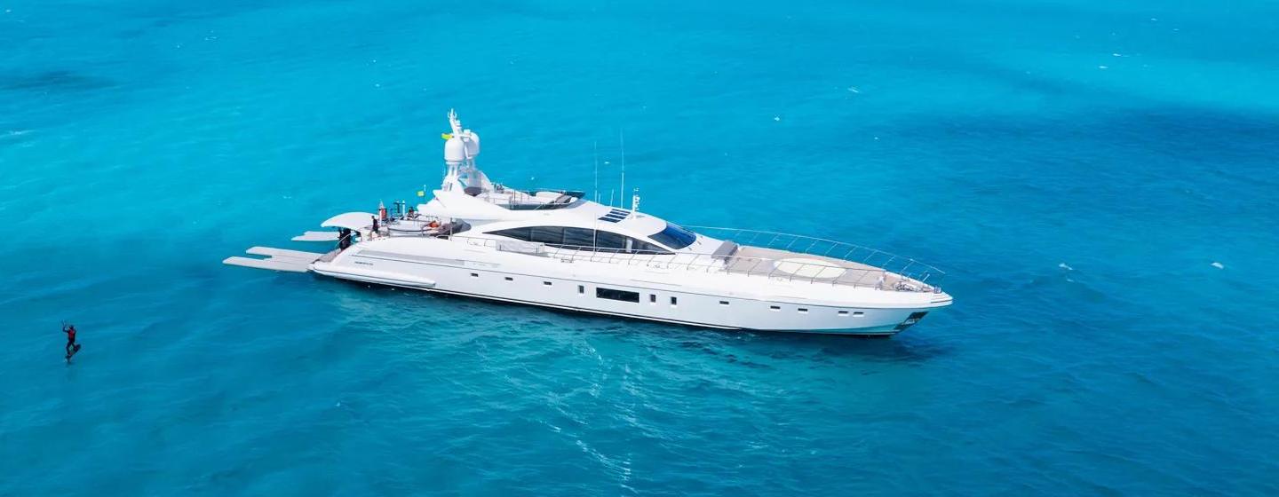 Mangusta yacht Firefly at anchor side view 