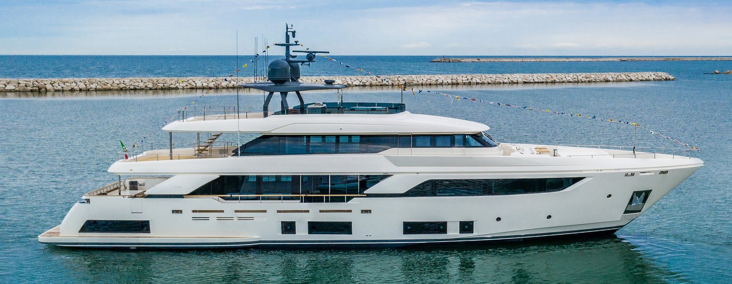  Custom Line motor yacht Kiki V at anchor side view 