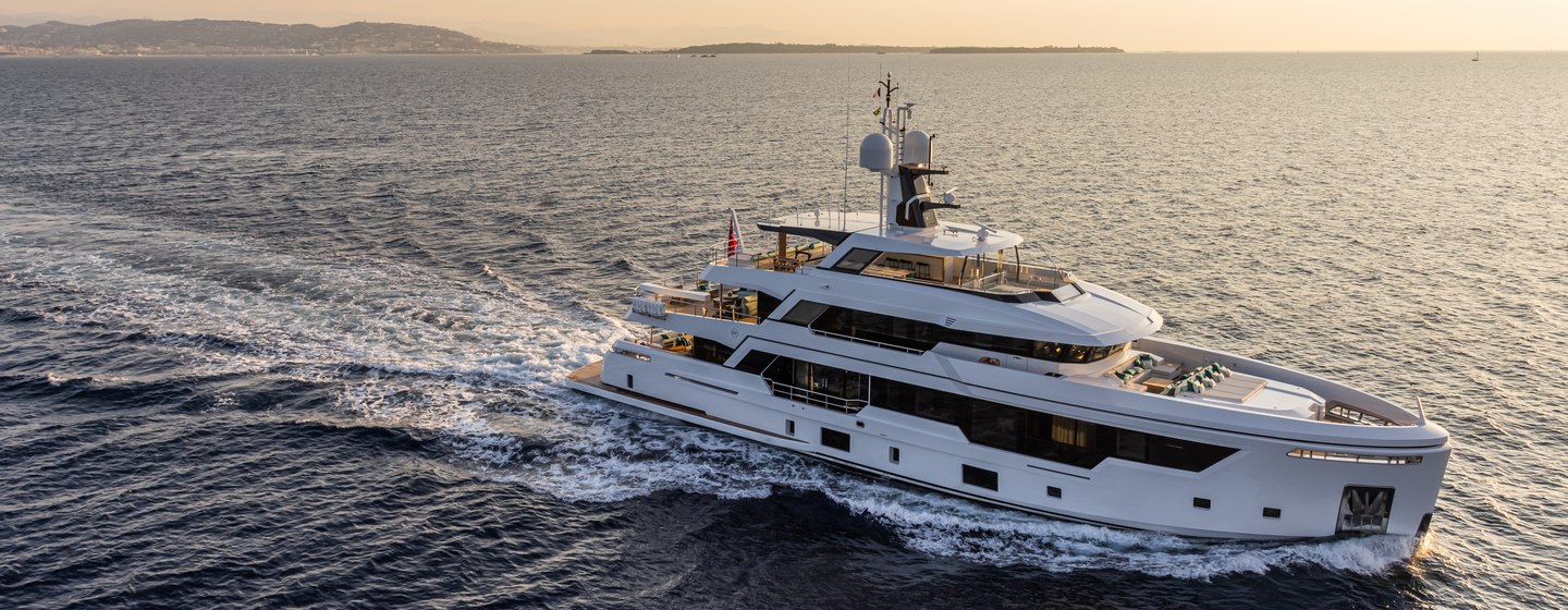 Rosetti superyacht EMOCEAN on water at sunset