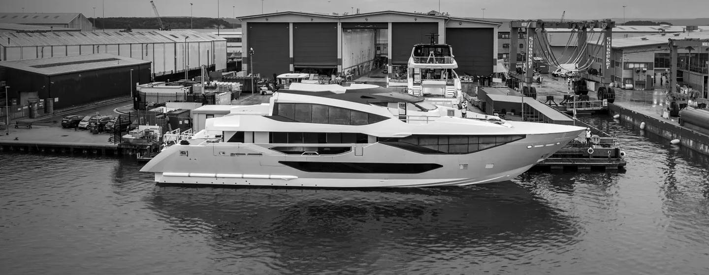 Sunseeker 134 Superyacht docked outside harbour in black and white