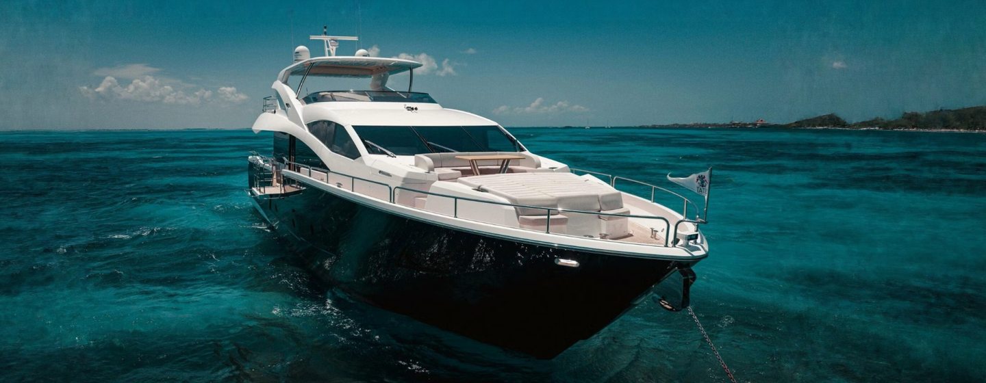 Sunseeker motor yacht Tatis at anchor bow view