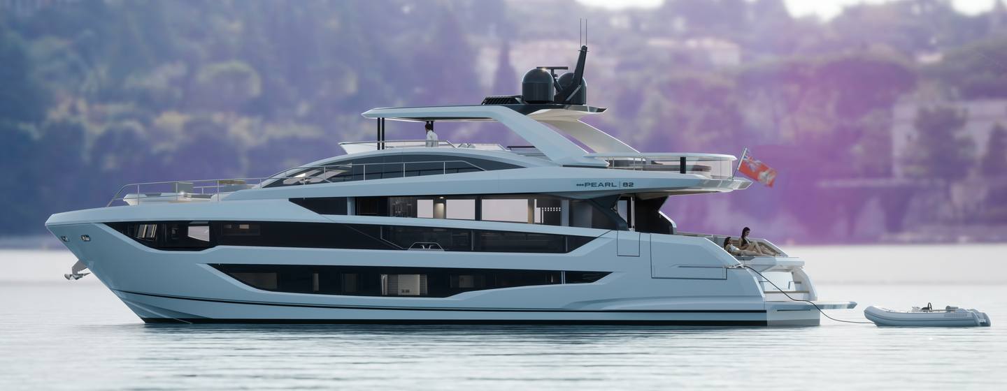 Pearl Yachts 82 on anchor in still waters, port side profile, shot taken from water level