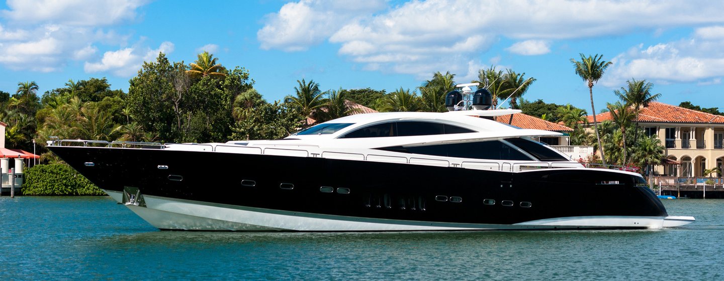 Superyacht at anchor side view 