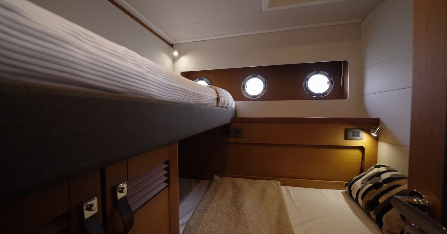 Beneteau-Swift-Trawler-54-Review-third-cabin-bunks