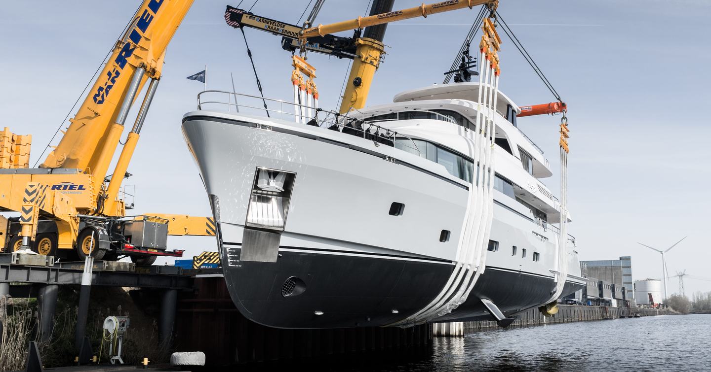 Eighth Moonen 122 Martinique motor yacht Lollipop being lowered into the water at launch