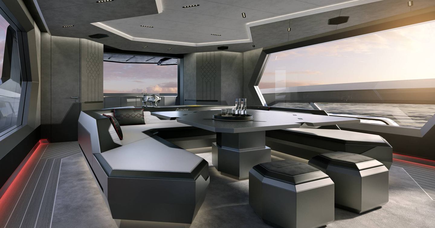 Rendering of Tecnomar for Lamborghini 101 motor yacht saloon with modular black and grey furniture 