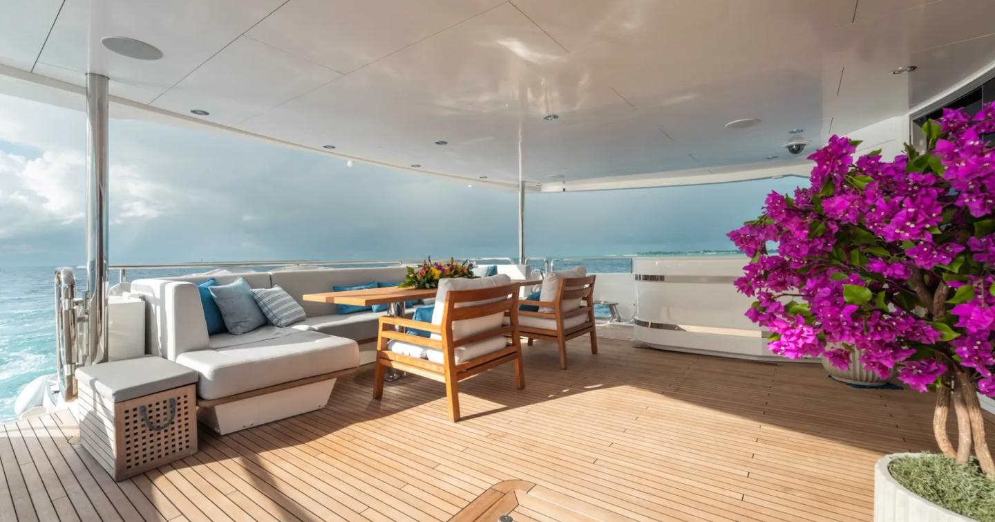 Sunseeker motor yacht Captain Morgan III aft deck dining area 