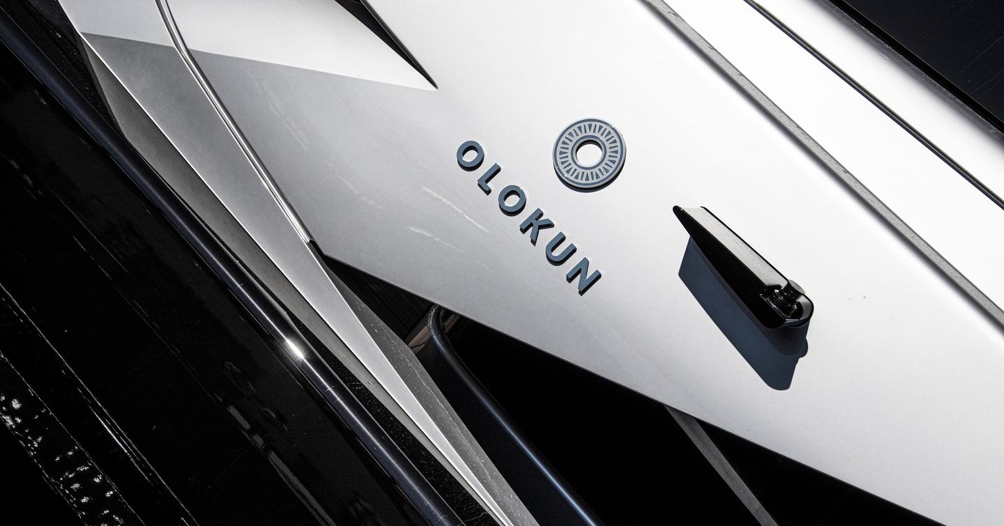 The Olokun logo and nameplate, as found on the superyacht itself