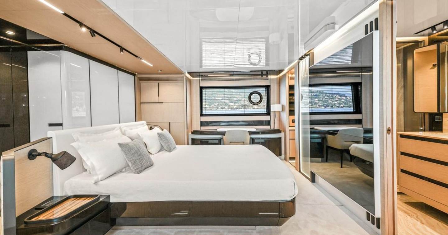 YB main cabin with large window and wardrobe