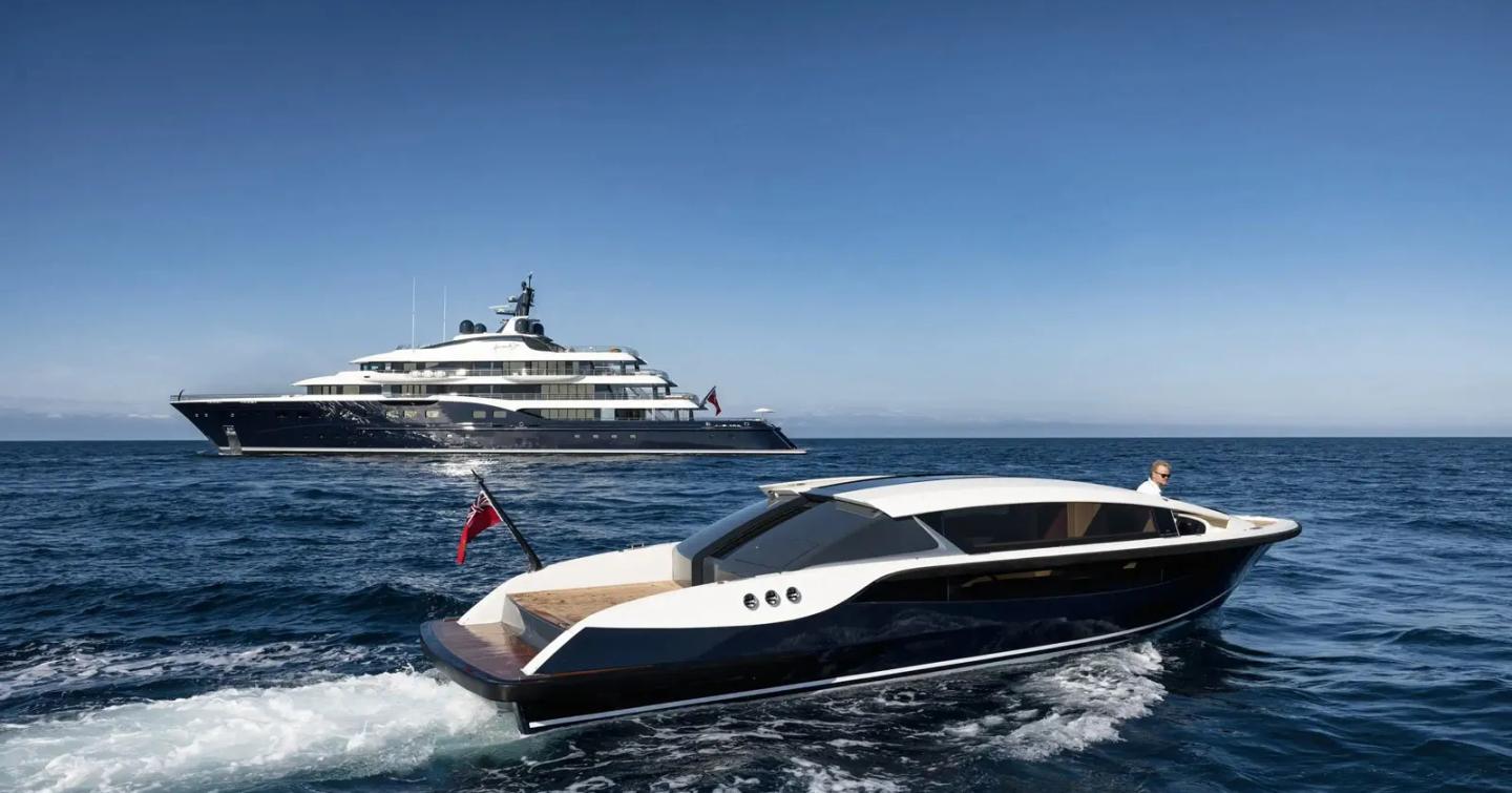 tender under way next to Superyacht Here Comes The Sun