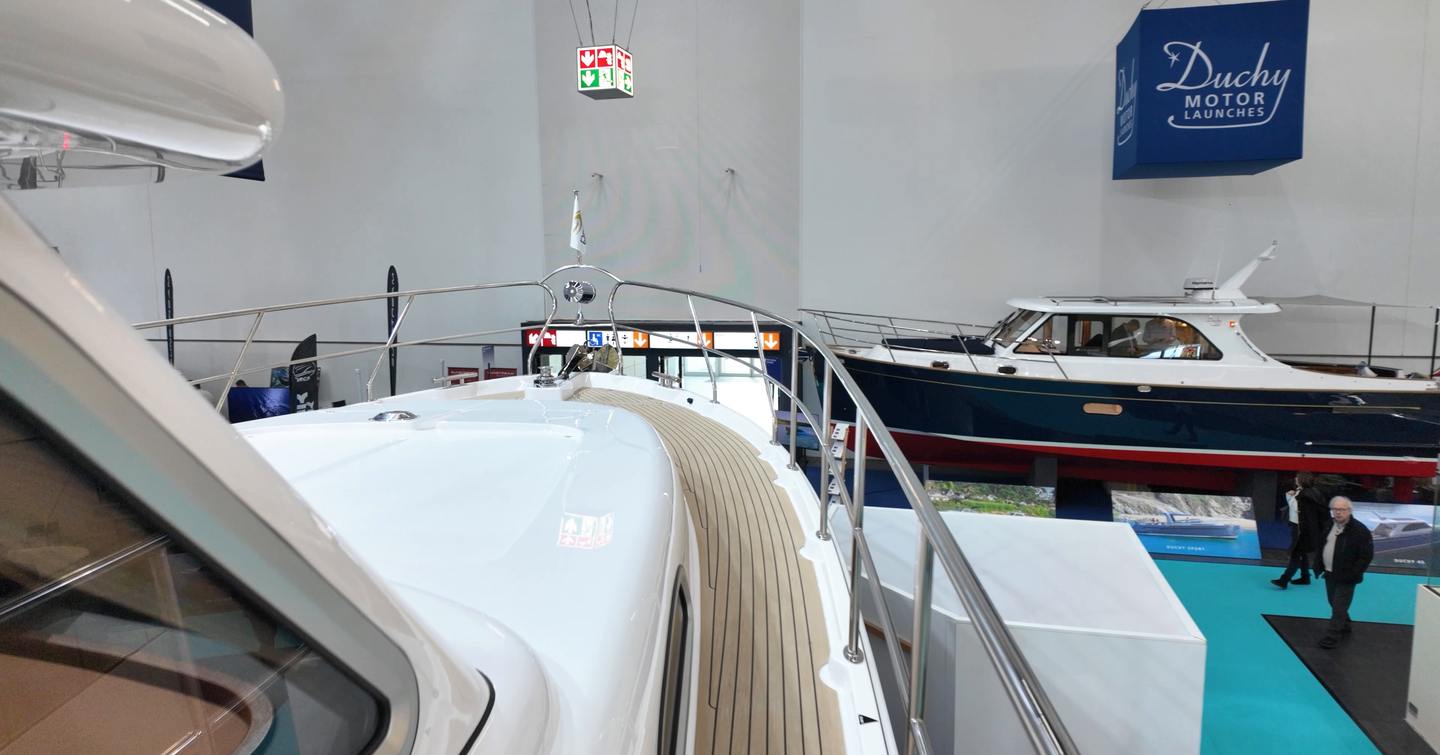 Elling E4 foredeck and side deck walkaround with stainless guardrails